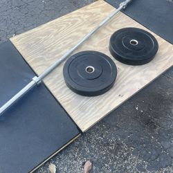Titan Bumper Plates With Olympic Barbell And Deadlifting Platform 