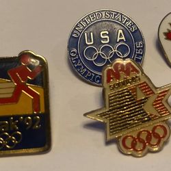 VINTAGE LOT OF 4 PINBACKS  OLYMPICS  PINS