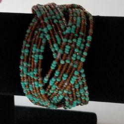 Beautiful Turquoise/ Brown Multi Stand Bracelet