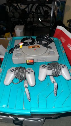 PlayStation with 2 controllers and memory card