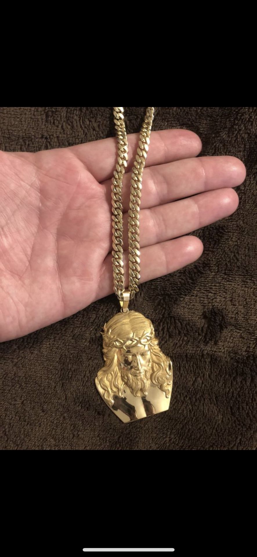 63 gram cuban link chain 10k gold with a 35 gram Jesus peace that’s also 10k gold asking 3k obo