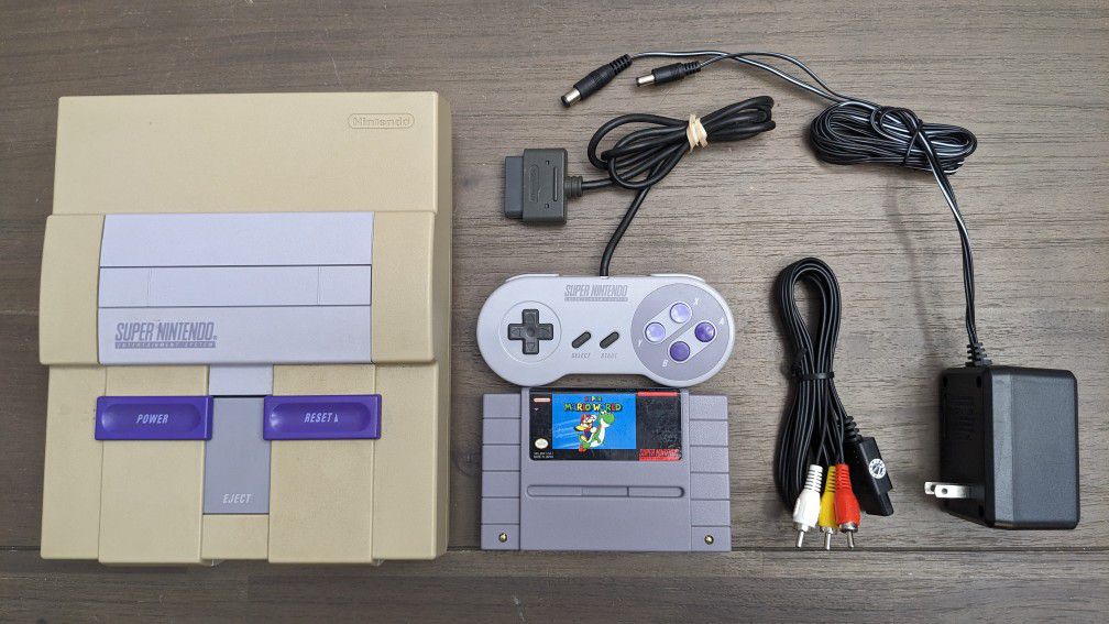 Super Nintendo SNES With Super Mario World Game OEM Controller And Cables.