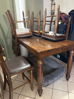 Table 4 Chairs And Tall Bottle Console