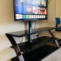 TV Stand- 3 In 1 .. Holds TVs Up to 65”
