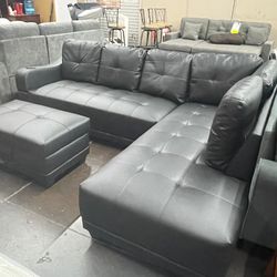 Black Leather Sectional with Storage Ottoman