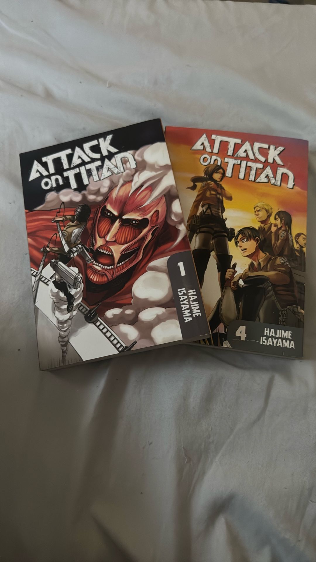 Attack on Titans books 1 & 4