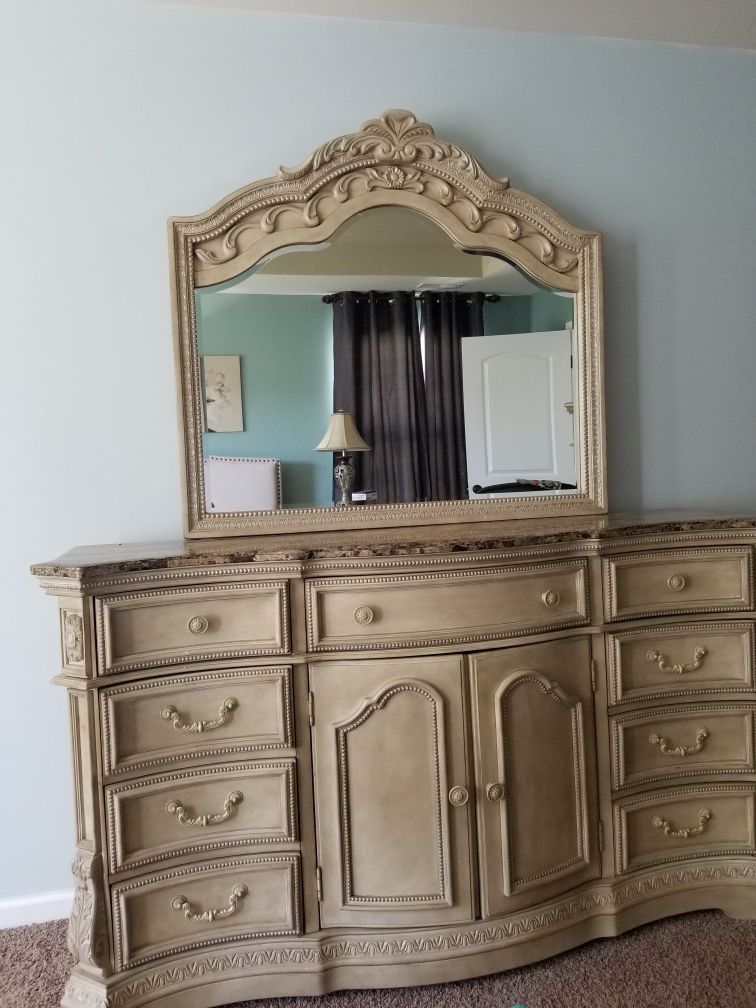 Ashley furniture Marble top Dresser with mirror, 2 matching nightstands and a dresser