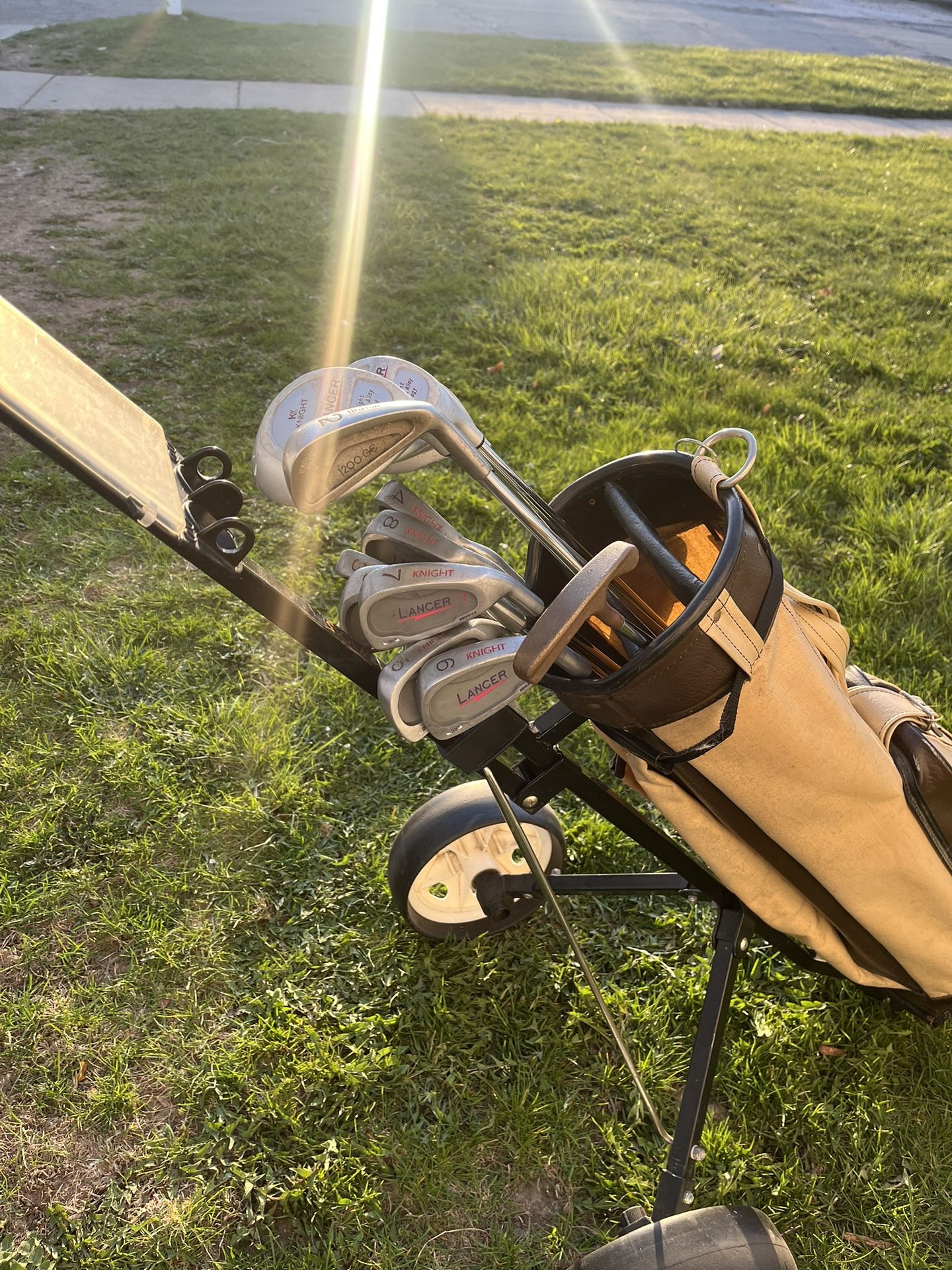 Golf Bag With Cart And Clubs