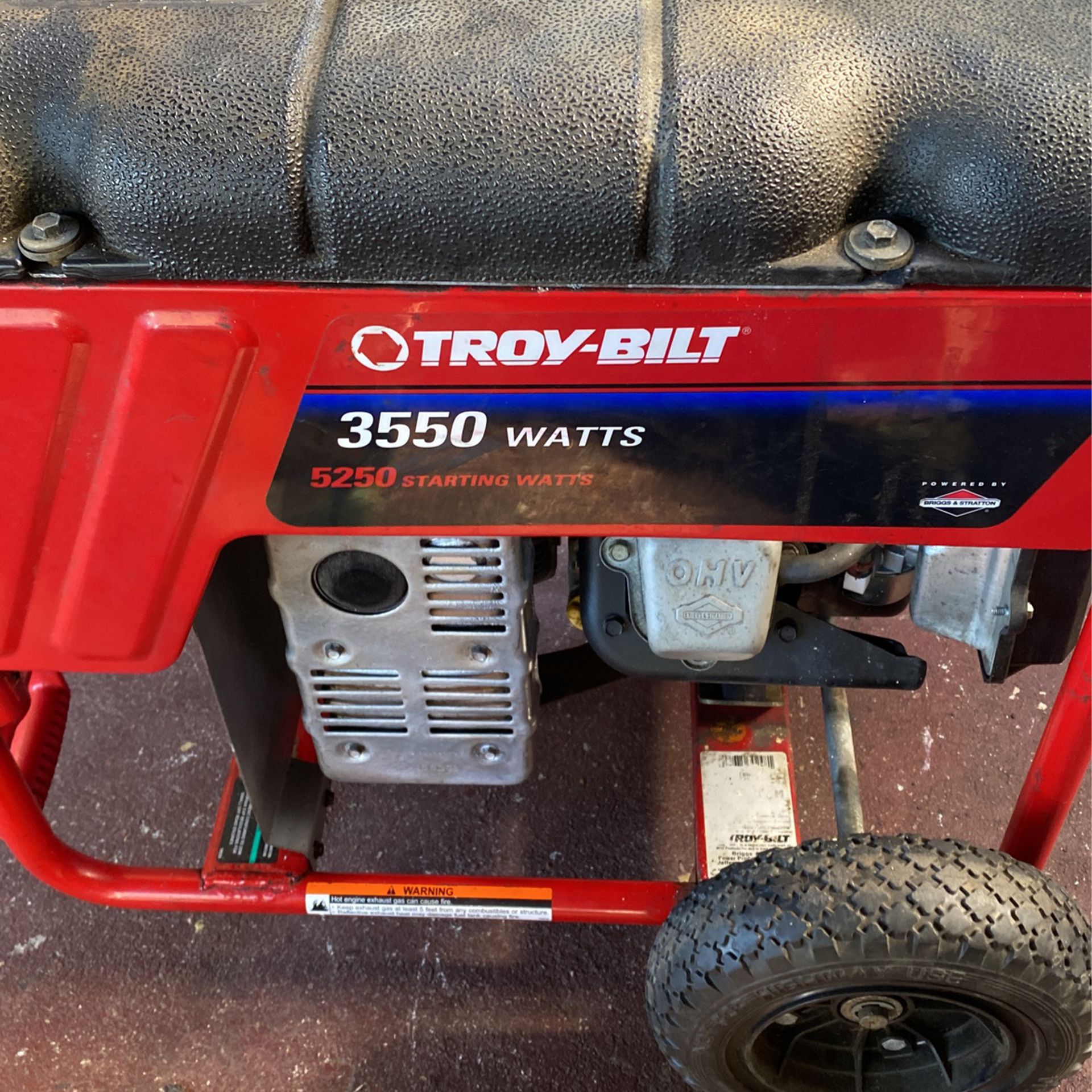 Troy Bilt with 7HP, new tires and new carburetor. Starts first pull.