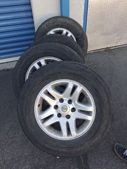 Set of 4 Toyota rims and tires