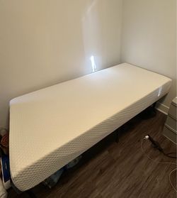 Twin XL bed mattress and frame (brand new)