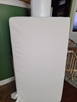 Crib mattress with waterproof cover