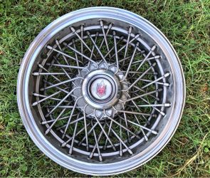 Vintage 15” chrome wire spoke hubcap