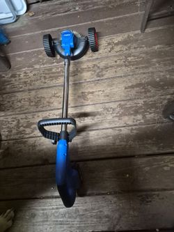Battery operated weed eater