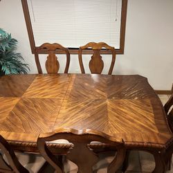 8 Person Dinning Table With leafy Included And 6 Chairs 