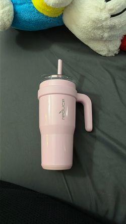 Pink different type of water bottles
