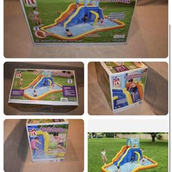 Description   The Aquatic Adventure™ Mega Water Park is the ideal backyard play experience. This inflatable water park features a safe and sturdy wate
