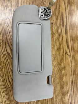 Left Hand (Driver Side) sun visor for a 2015 Infiniti Q50