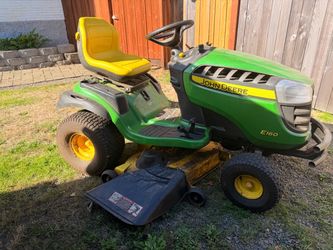 John Deere riding lawn mower