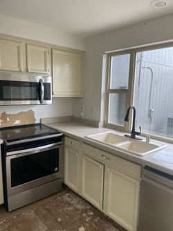 All appliances and cabinets 1500.00