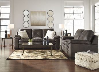 Ashley sofa and love seat , new Wholesale furniture center 25 w 39th street Kansas City mo 64111 Monday thru Saturday 10 am to 6 pm No credit neede