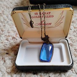 Elegant “Mid-century Anson,” “Gold-filled vintage necklace,” “Faceted blue stone,” “Original box included.”  