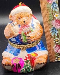 This is a Mr. Christmas Teddy Bear Porcelain Animated Music Box