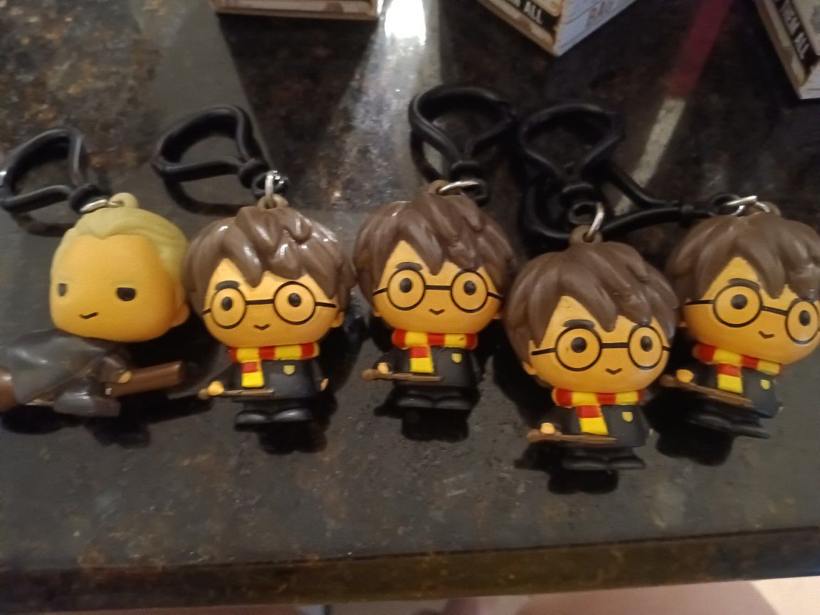 Four Harry Potter And Draco Collectible Bag Tags