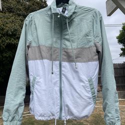 Green and white windbreaker jacket with drawstring