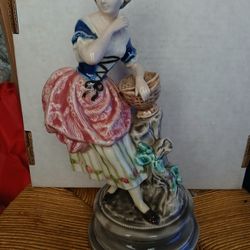 Pair of Vintage Porcelain Statues