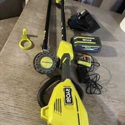 RYOBI 40V 15 in. Expand-It Cordless Battery Attachment Capable String Trimmer with 4.0 Ah Battery and Charger