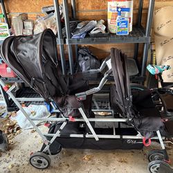 Joovy Big caboose sit to stand triple stroller