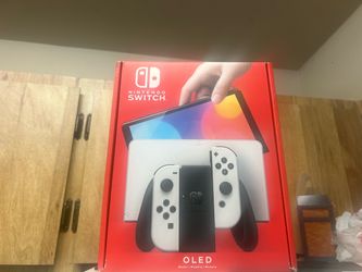 Nintendo Switch OLED  Console  64 GB internal storage with white joy stick for