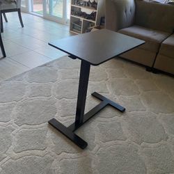 Mobile adjustable desk with hidden wheels