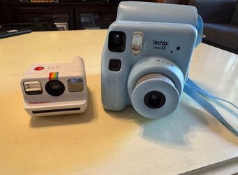 instant cameras both only $80