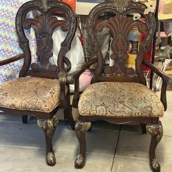 Two Brown Wood Chairs For Sale