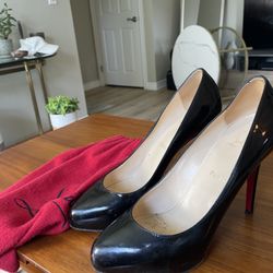 Christian Louboutin Red Bottoms 8.5