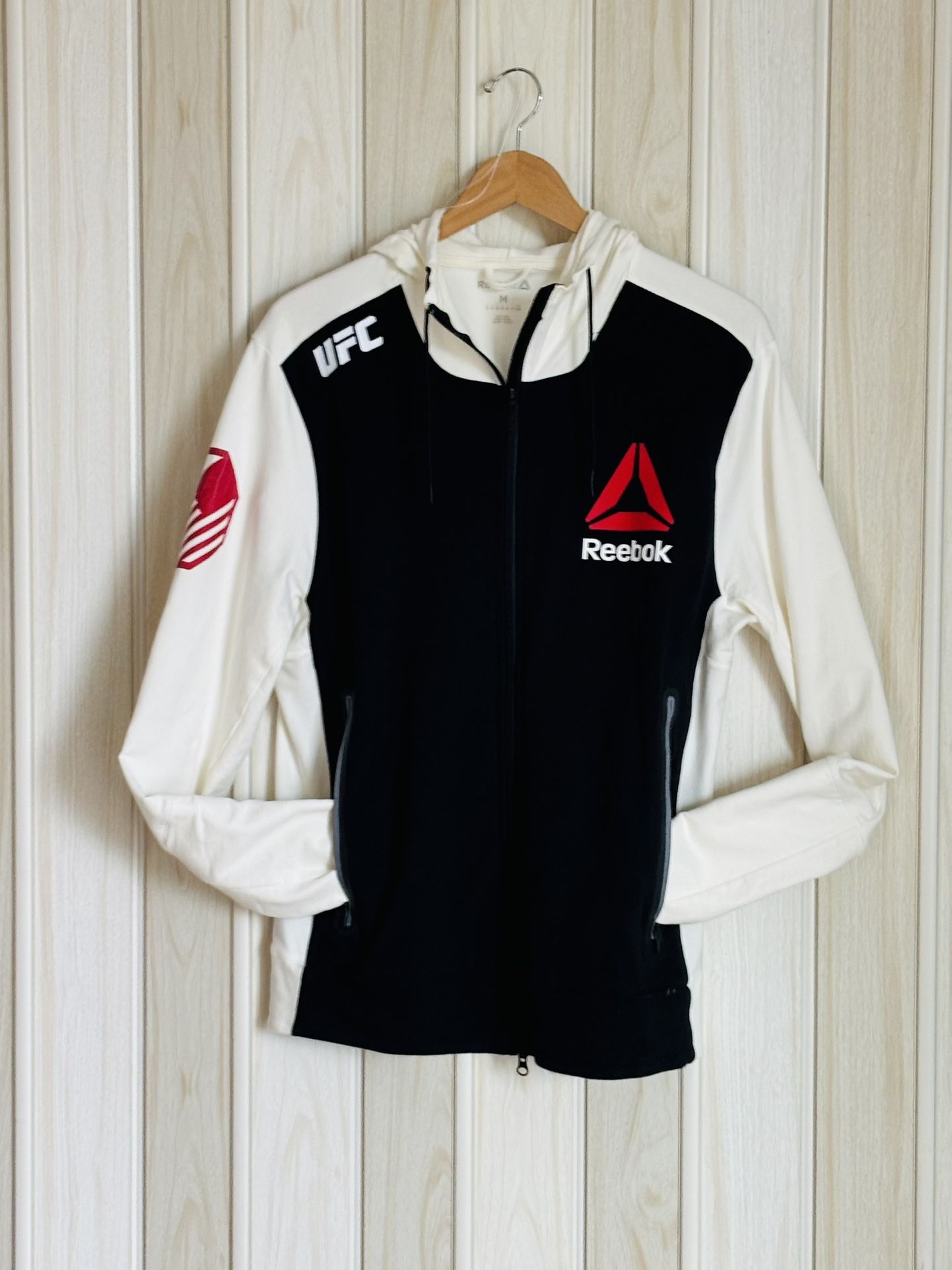 REEBOOK; UCL BLACK & CREAM HOODIE JACKET SIZE M