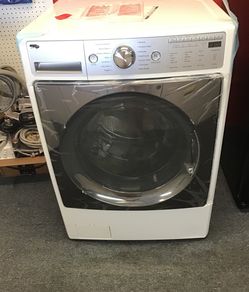 New scratch and dent kenmore front load washer. 1 year warranty