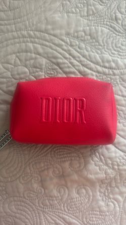 Red Dior make up bag