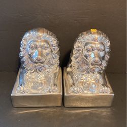 Silver On Porcelain lion figurines. Can be used as shingles or occasions 7 inches tall.