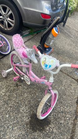 Bicycle size 16 w/. Training wheels. Pick up.  E.  Side.  Tacoma
