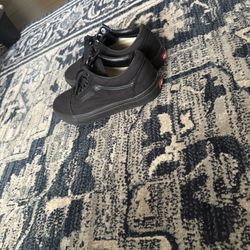 All-Black Minimalist Vans Sneakers.