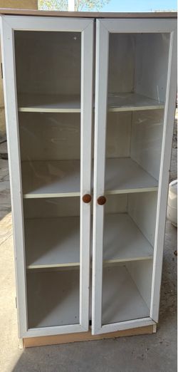 Small cabinet with glass doors