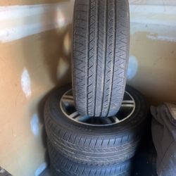 4 Like New Tires and Rims from a 2012 Dodge Charger SE