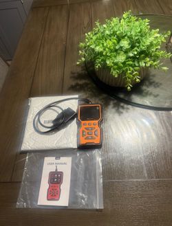 Brand New never used OBDII car diagnostic tool.