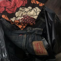 8 Bags Of New And Used Clothing All Brands