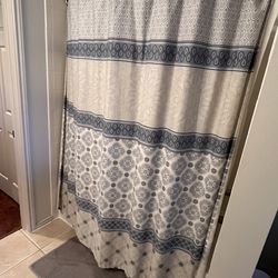 Blue and white shower curtain