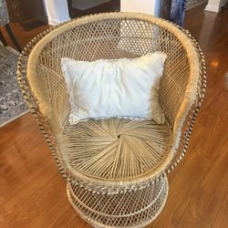 Vintage Rattan Accent Chair – $100  Beautiful vintage rattan accent chair, approximately 30 inches tall. Very sturdy, lightweight, and perfect for a b