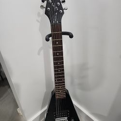 Flying V Guitar Good Condition Minor Chip Plays Great Comes With A Fender 15g Amp Power Cable Included PRICE NEGOTIABLE.